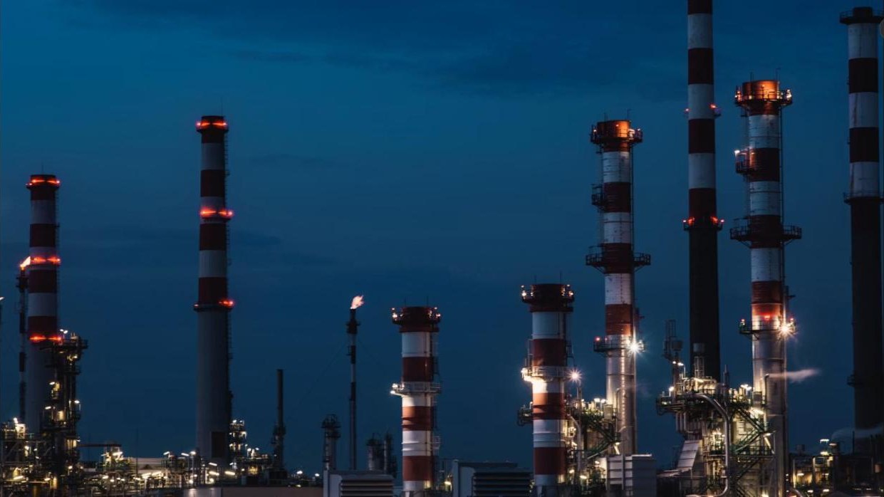 Industrial refinery complex, representing structured funding solutions